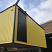 Дом из блок-контейнера, желтый профнастил