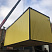 Дом из блок-контейнера, желтый профнастил